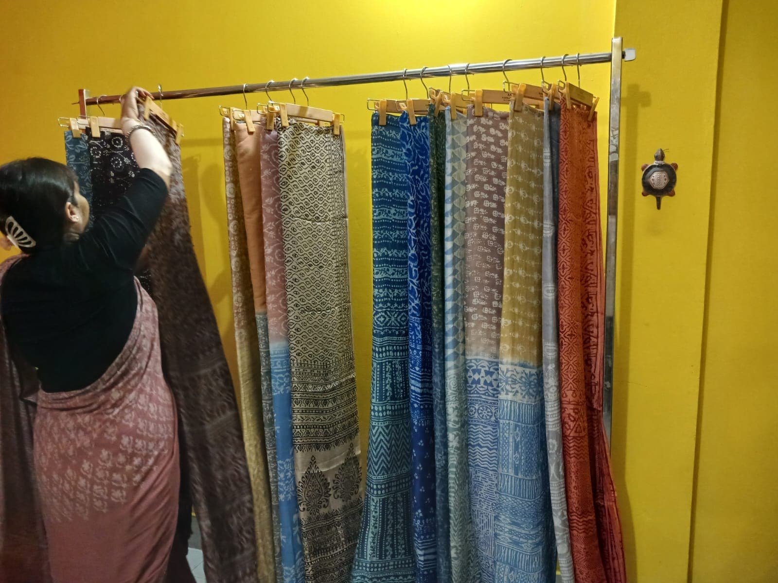Women entrepreneurs showcasing products at Shantibari
